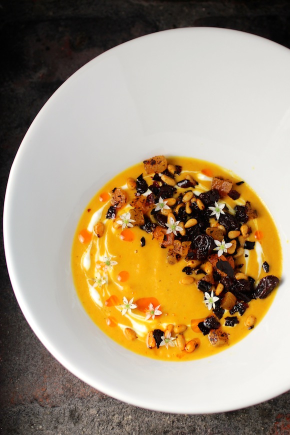 Sweet and Spicy Pumpkin Apple Soup with Dried Fruit, Pine Nuts, and Chile de Arbol