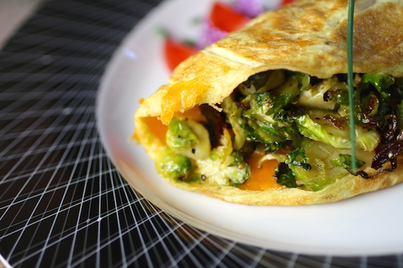 Quinoa Omelette filled with Roasted Brussels Sprouts and Cheddar