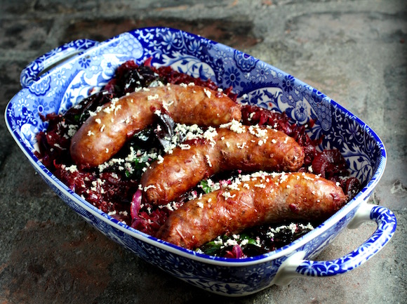Bratwurst Braised in Beer with Beet Greens and Red Cabbage, Fresh Horseradish