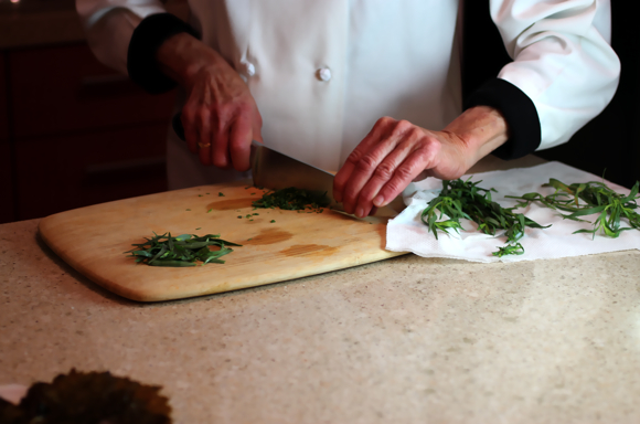 chef chopping tarragon