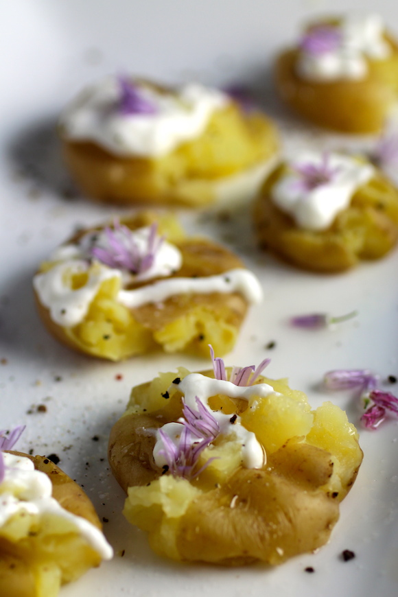 Precious Potato Bites ~ Truffle Oil, Sour Cream, Chive Blossoms