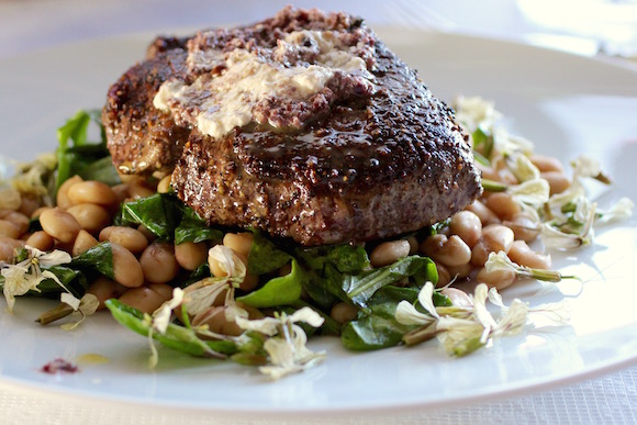 Beef Filet, Horseradish-Olive Tapenade, Cannellini Beans, Spinach, Arugula Flowers