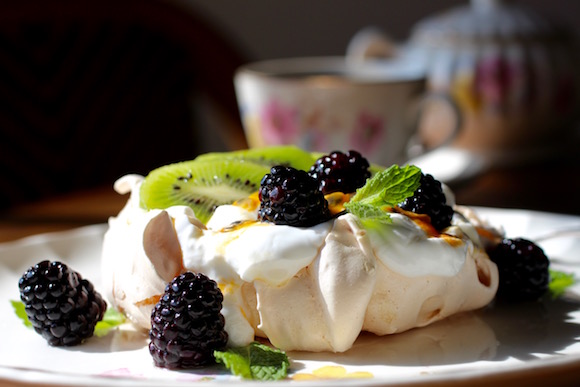 Pavlova with Whipped Yogurt Cream, Kiwi, Passion Fruit, Blackberry, Mint