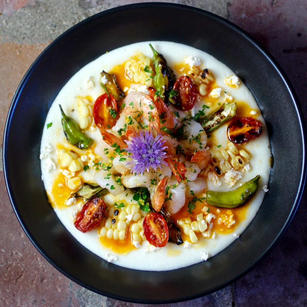 Shrimp and Grits with Lemony Lobster Butter and Grilled Corn, Okra, Tomato, Shishito 