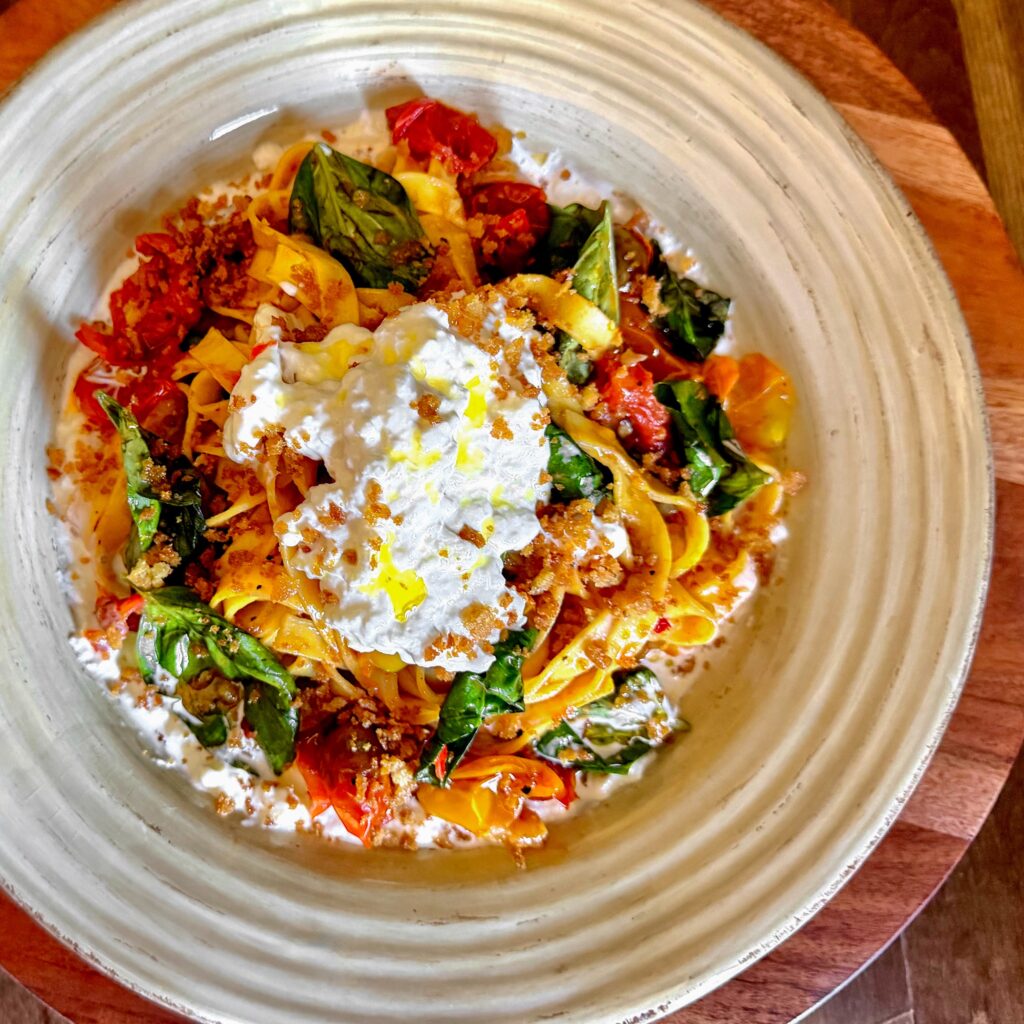 Fresh Fettuccine with Stracciatella, Blistered Tomatoes, and Basil
