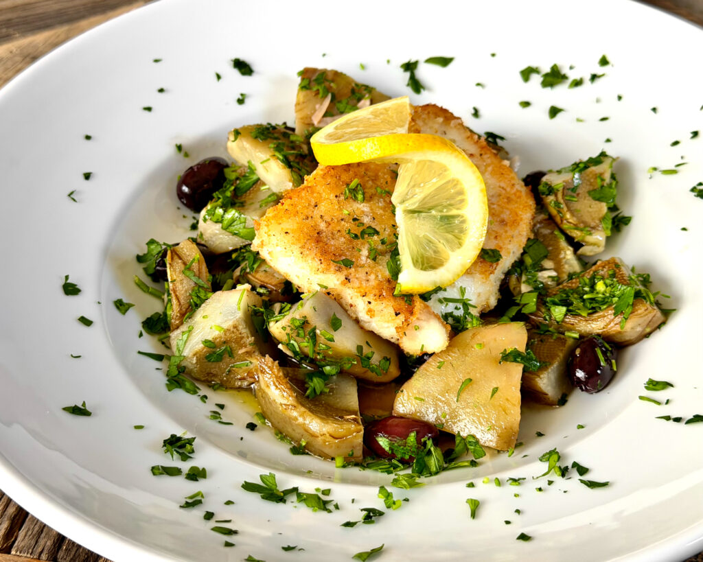 Margaritaville's Halibut with Artichoke Ragout