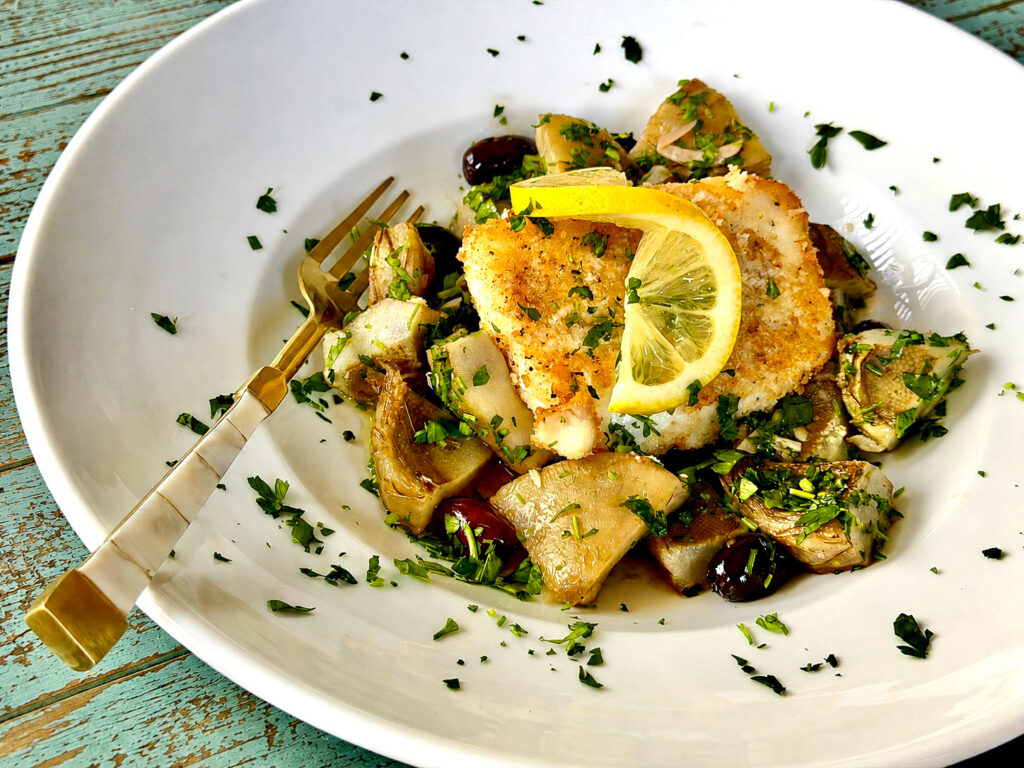 Margaritaville's Halibut with Artichoke Ragout